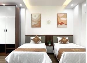 Postel nebo postele na pokoji v ubytování KING HOTEL