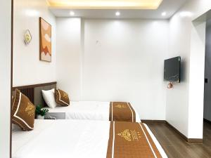 Postel nebo postele na pokoji v ubytování KING HOTEL