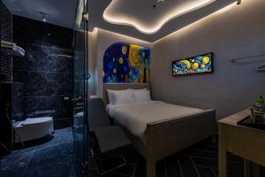 Postel nebo postele na pokoji v ubytování Pynt Hotel 2