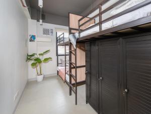 Un pat suprapus sau paturi suprapuse la The Grid Co-Living Managed by HII