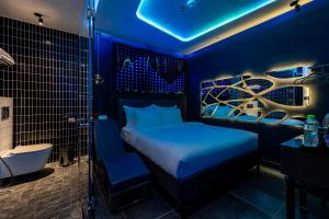 Postel nebo postele na pokoji v ubytování Pynt Hotel 2