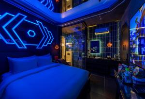 Postel nebo postele na pokoji v ubytování Pynt Hotel 2