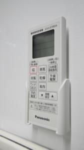 a white cell phone sitting on top of a shelf at HANASTAY花渓居 椿Tsubaki in Osaka