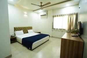 Katil atau katil-katil dalam bilik di Hotel Anand