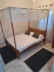 Postel nebo postele na pokoji v ubytování Anna Estate