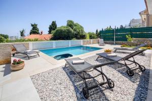 Ảnh trong thư viện ảnh của Delightfully house with a private pool and a sea view ở Premantura