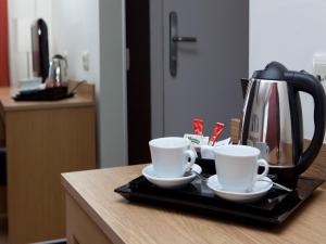 Příslušenství pro přípravu čaje a kávy v ubytování Hotel Sagrada Familia