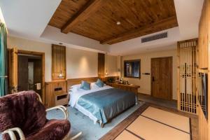 Foto da galeria de Hezetang Cultural Boutique Homestay em Yi