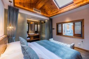 Foto da galeria de Hezetang Cultural Boutique Homestay em Yi