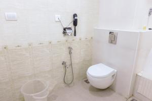 Koupelna v ubytování Hotel DSF Grand Plaza