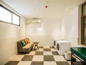 Photo de la galerie de l'établissement City Comfort Premier Hotel Xiong County Baiyangdian High-speed Railway Station, à Baoding