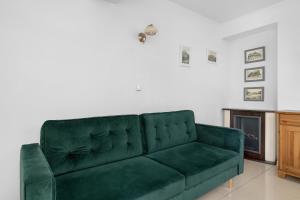 Χώρος καθιστικού στο Przestronne Apartamenty w Zakopanem z Trzema Sypialniami i Parkingiem by Noclegi Renters