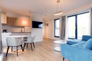 Posezení v ubytování Syndicate Lodging Aparthotel
