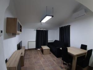 TV a/nebo společenská místnost v ubytování Caxa Xavier - Apartamento 3