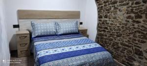 Postel nebo postele na pokoji v ubytování Caxa Xavier - Apartamento 3