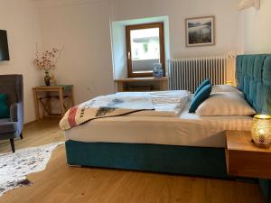 Posteľ alebo postele v izbe v ubytovaní Haus Standlgut Rauris -- incl Sommercard