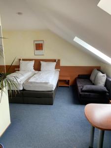 Postel nebo postele na pokoji v ubytování Hotel Nord