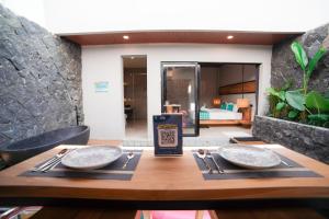 Гостиная зона в Ubu Villa Amara in North Yogyakarta