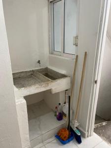 a bathroom being remodeled with a sink in a room at Departamento vacacional in Mazatlán +2 photos