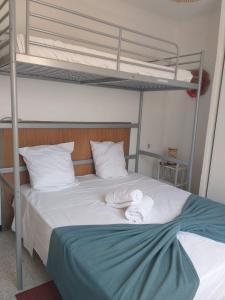 Postel nebo postele na pokoji v ubytování Haut de villa-Proche plage-Calme