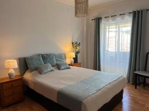 Ένα ή περισσότερα κρεβάτια σε δωμάτιο στο Sun And Ocean House with 2 bathrooms