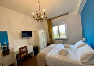 Postel nebo postele na pokoji v ubytování Panoramic Rooms