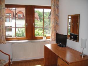 TV a/nebo společenská místnost v ubytování An der Linde + 4 fotografie