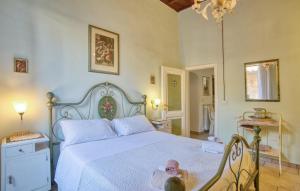 Postel nebo postele na pokoji v ubytování Palazzo Falzacappa