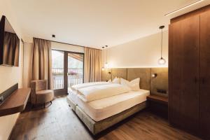 Letto o letti in una camera di Hotel Weisseespitze