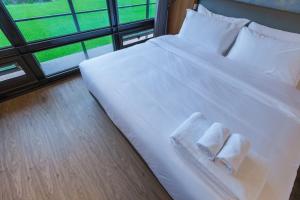 Postel nebo postele na pokoji v ubytování Juan Teppan-yaki B&B