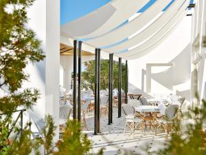 A restaurant or other place to eat at Caramel, A Grecotel Resort to Live
