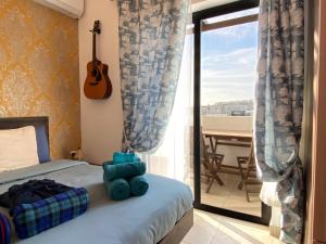 Ένα ή περισσότερα κρεβάτια σε δωμάτιο στο KIMRAY Boutique Apartment - Indulge in Comfort, Embrace Tranquility