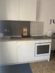 Kuchyň nebo kuchyňský kout v ubytování Casa Elisa 8