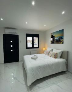 En eller flere senge i et værelse på Moderne Studio proche ORLY- Paris