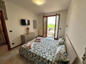 Ένα ή περισσότερα κρεβάτια σε δωμάτιο στο Al Riparo - Comfort near Verona