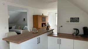 Kuchyň nebo kuchyňský kout v ubytování Gästehaus Upland