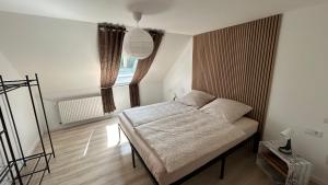 Postel nebo postele na pokoji v ubytování Gästehaus Upland