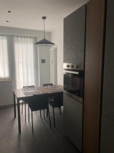 Kuchyň nebo kuchyňský kout v ubytování Appartamento Panorama 1