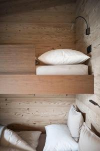 Katil atau katil-katil dalam bilik di Chalet Yak Häusl - Sauna & Whirlpool
