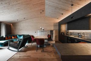 Posezení v ubytování Chalet Yak Häusl - Sauna & Whirlpool