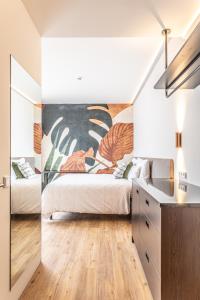 Voodi või voodid majutusasutuse Hotel DAS SAAL toas