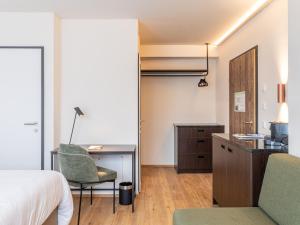 Voodi või voodid majutusasutuse Hotel DAS SAAL toas
