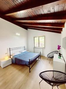 Katil atau katil-katil dalam bilik di Casa Giuly , attico sul lago