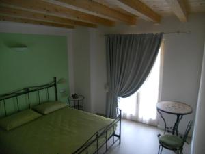Postel nebo postele na pokoji v ubytování B&B La Teiera