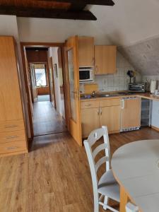 Kuchyň nebo kuchyňský kout v ubytování Apartmenthaus - Haus am Schultal,