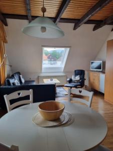 TV a/nebo společenská místnost v ubytování Apartmenthaus - Haus am Schultal,