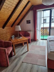 Postel nebo postele na pokoji v ubytování Apartmenthaus - Haus am Schultal,