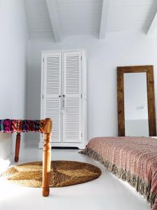 Cama o camas de una habitación en Akassa Alojamientos Bioclimaticos en las Hurdes