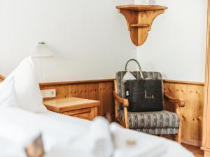 Letto o letti in una camera di Regitnig - 4 Sterne Hotel und Chalets