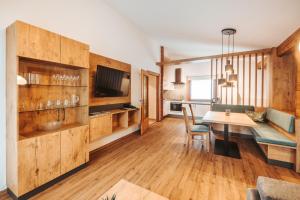 TV o dispositivi per l'intrattenimento presso Regitnig - 4 Sterne Hotel und Chalets